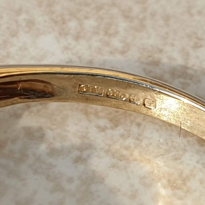 Topaz and Synthetic Ruby Trilogy Ring in 9ct Gold.