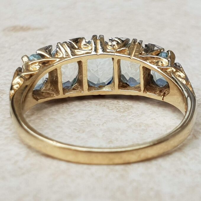 Beautiful Five Stone Aquamarine Ring in 9ct Gold, a UK O or a US 7 1/2.