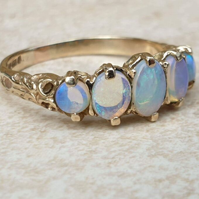 Graduating Five Stone Opal Ring in 9ct Gold,  a UK O or a US 7 3/4.
