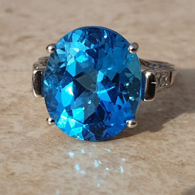 Swiss Blue Topaz Solitaire Ring in 9ct White Gold,  a UK N 1/2 or a US 7 1/4.