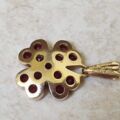 Garnet Four Leaf Clover Pendant in 9ct Gold