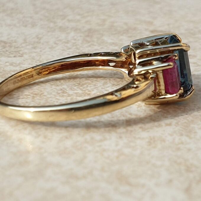 Topaz and Synthetic Ruby Trilogy Ring in 9ct Gold.