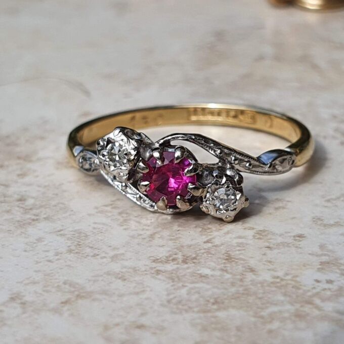 Ruby & Diamond Crossover Ring in 18ct Gold and Platinum.
