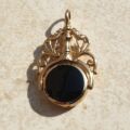 Ornate Double Sided Agate and Onyx Spinner Fob in 9ct Gold.