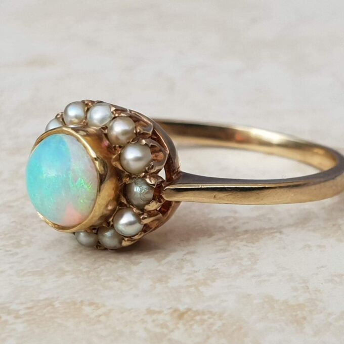Stunning Opal and Split Pearl Halo Ring in 9ct Gold, a UK L 1/2 or a US 6 1/4.