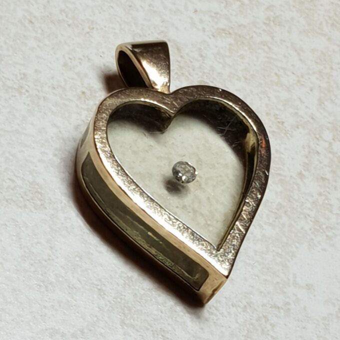 Delightful Floating Diamond Heart Pendant in 9ct Gold