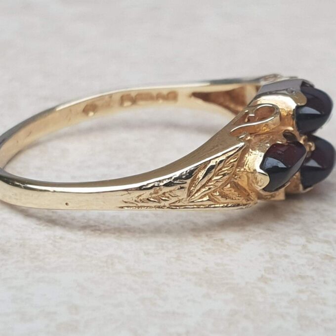 Garnet Cabochon Ring in 9ct Gold,  a UK N 1/2 or a US 7.