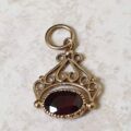 Tiny Garnet Fob Charm in 9ct Gold