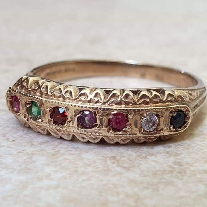 REGARDS Acrostic Ring in 9ct Gold, a UK O or a US 7 1/2