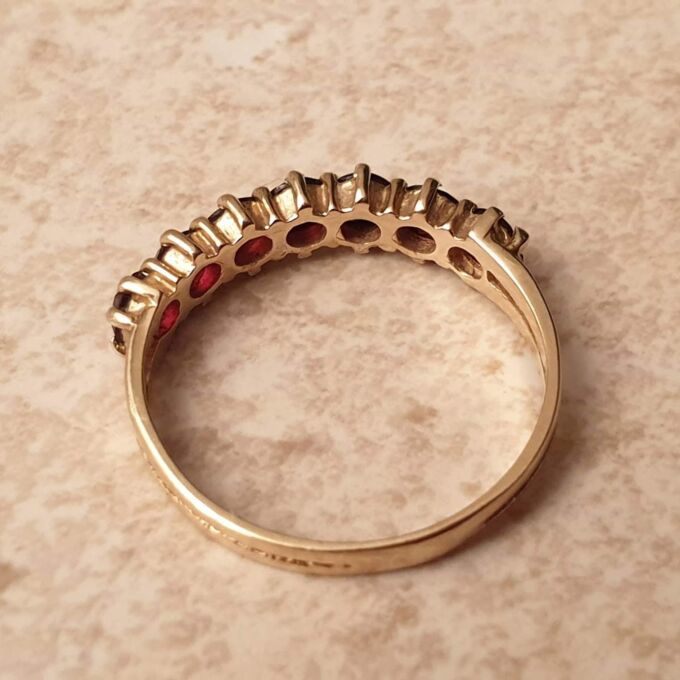 Seven Stone Garnet Band in 9ct Gold, a UK L 1/2 or a US 6