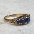 Vibrant Blue Five Stone Synthetic Sapphire Ring in 9ct Gold, a UK N or a US 7.