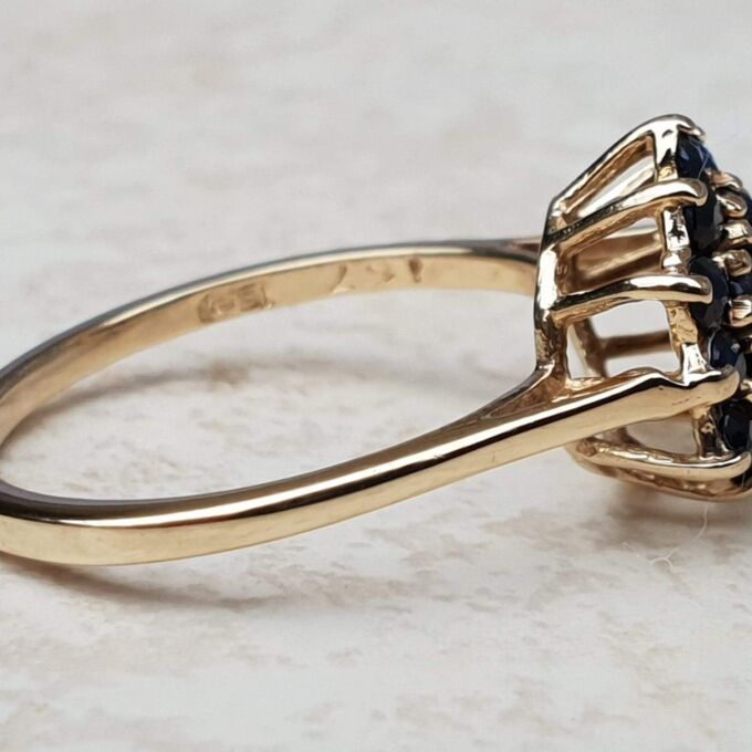 Synthetic Sapphire Cluster Ring in 9ct Gold, a UK M 1/2 or a US 6 3/4.