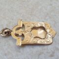 Shield Medallion in 9ct Gold.