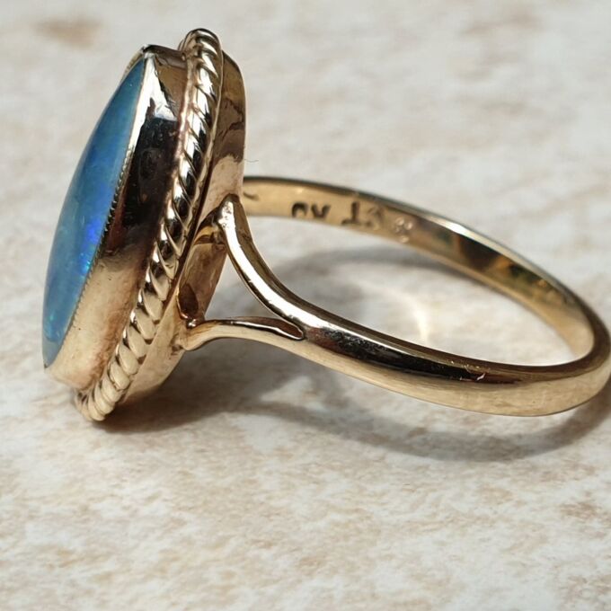 Oval Opal Doublet Ring in 9ct gold, a UK O or a US 7 1/2