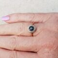 Sapphire and Diamond Halo ring in 18ct Gold and Platinum, a UK M or a US 6 1/2.