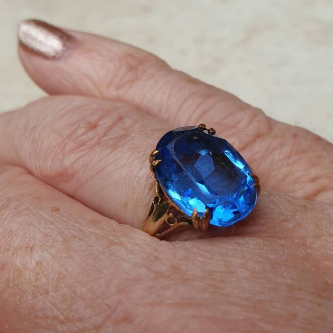 Eye-catching Blue Paste Solitaire in 9ct Gold, a UK P 1/2 or a US 8 1/4.