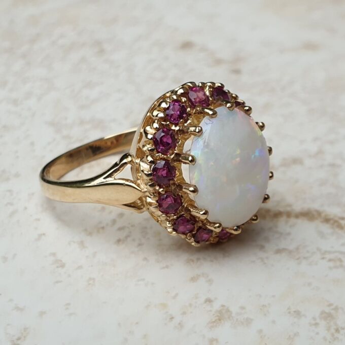 Opal & Ruby Ring in 9ct Gold, a UK O or a US 7 1/2