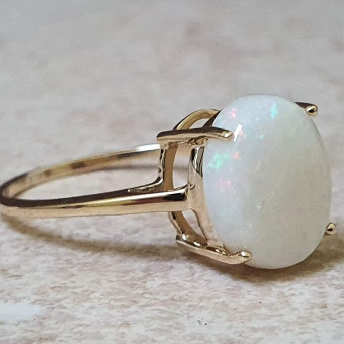 Simple Opal Solitaire Ring in 9ct Gold.