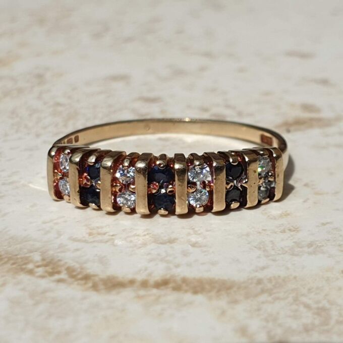 Sapphire and Paste Duo Stone Band in 9ct Gold,  a UK N or a US 7.