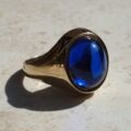 Synthetic Sapphire Cabochon Signet Ring in 9ct Gold, a UK P 1/2 or a US 8.