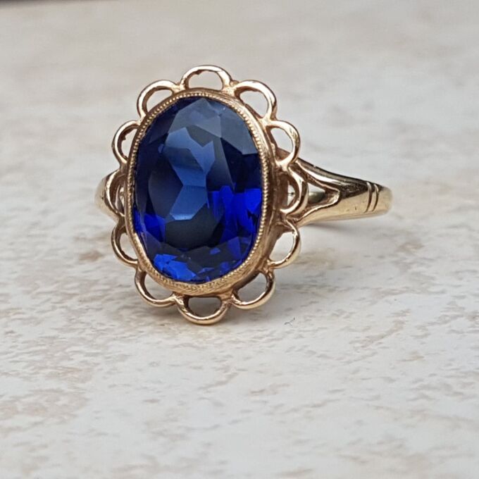 Synthetic Sapphire Solitaire Ring in 9ct Gold, a UK K or a US 5 3/4.