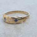 Sapphire and Diamond Three Stone Ring in 18ct Gold, a UK K or a US 5 1/2
