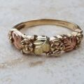 Flower and Leaf Design Ring in 9ct yellow & rose gold, a UK O or a US 7 1/2