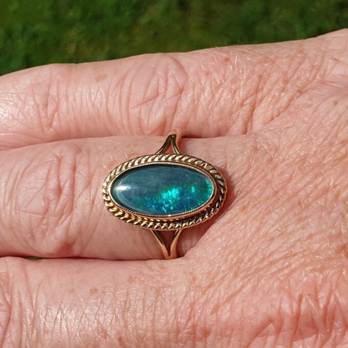 Oval Opal Doublet Ring in 9ct gold, a UK O or a US 7 1/2