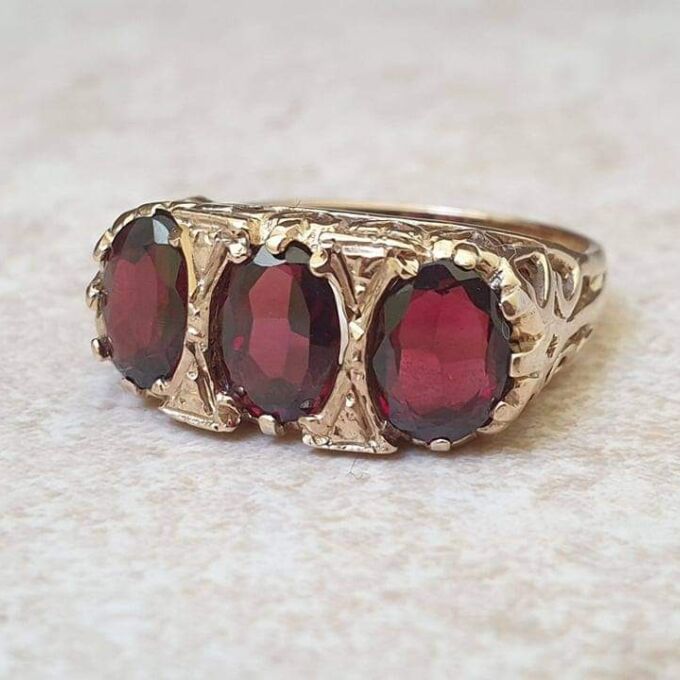 Three Stone Garnet Ring in 9ct Gold.