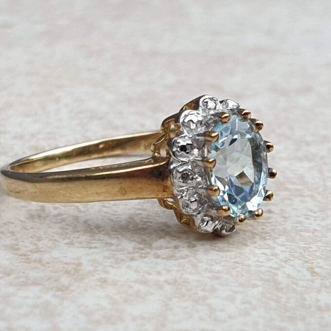 Aquamarine and Diamond Cluster Ring in 9ct Gold,  a UK M 1/2 or a US 6 3/4.
