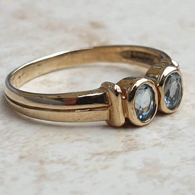 Torque Style Topaz Ring in 9ct Gold,  a UK M or a US 6 1/2.