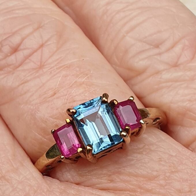 Topaz and Synthetic Ruby Trilogy Ring in 9ct Gold.