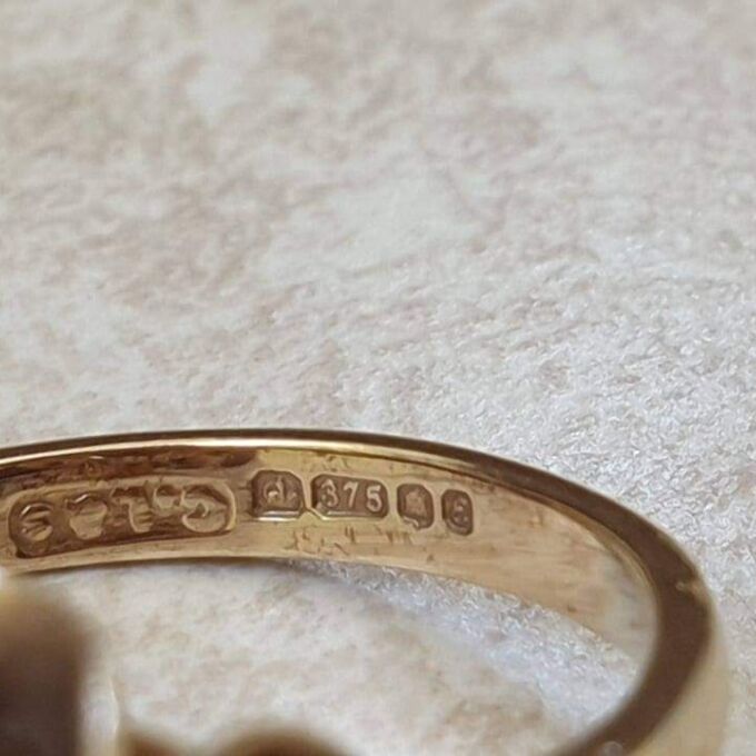 Oval Smoky Quartz Ring in 9ct Gold.