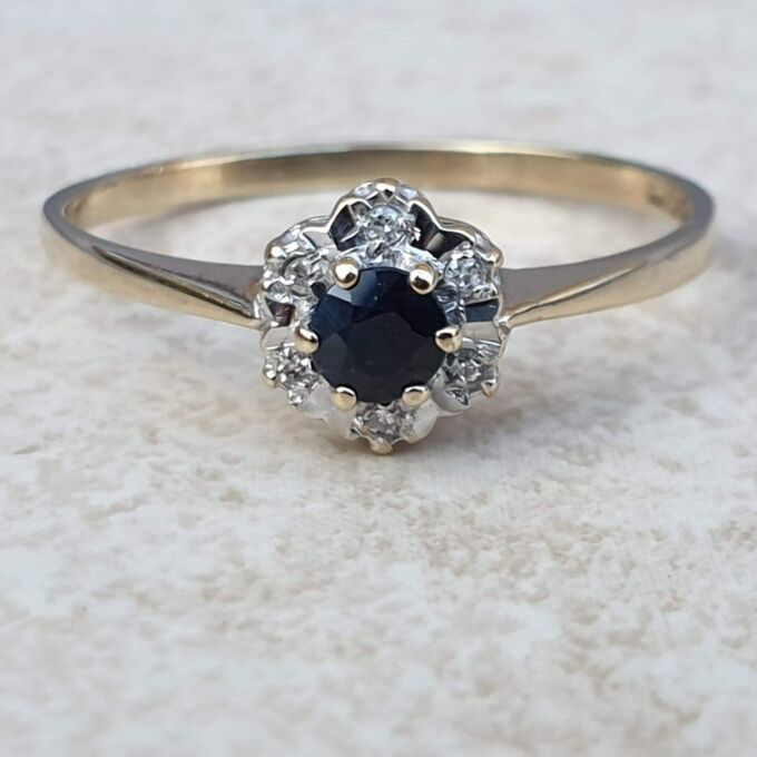 Sapphire and Diamond Ring in 9ct Gold,  a UK S or a US 91/2.