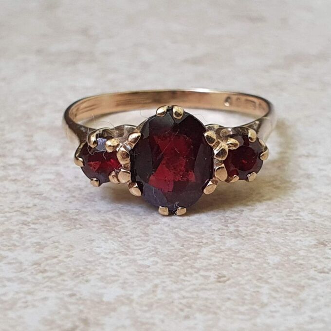 Garnet Trilogy Ring in 9ct Gold.