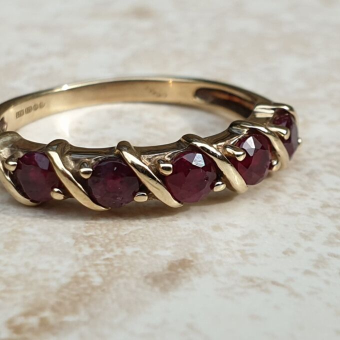 Five Stone Ruby Ring in 9ct Gold.