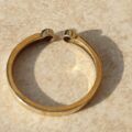 Diamond Set Torque Ring in 9ct Gold,  a UK M 1/2 or a US 6 3/4.