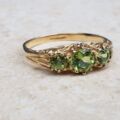 Summery Peridot Three Stone Ring in 9ct Gold, a UK N 1/2 or a US 7 1/4.