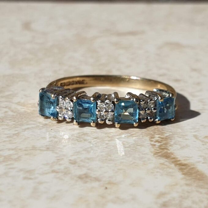 Bright Swiss Blue Topaz and Diamond Band in 9ct Gold, a UK J 1/2 or a US 5 1/4.