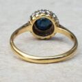 Sapphire and Diamond Halo ring in 18ct Gold and Platinum, a UK M or a US 6 1/2.
