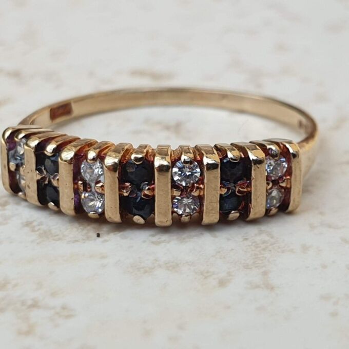 Sapphire and Paste Duo Stone Band in 9ct Gold,  a UK N or a US 7.