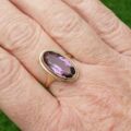 Elongated Oval Amethyst Solitaire Ring in 9ct gold.