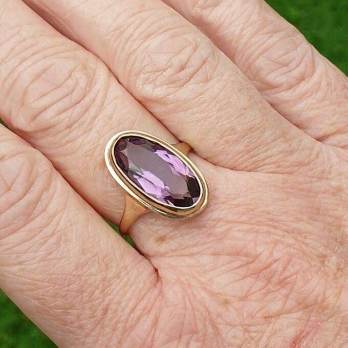 Elongated Oval Amethyst Solitaire Ring in 9ct gold.