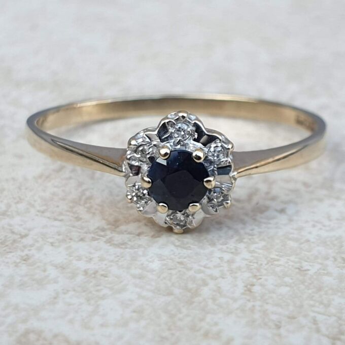 Sapphire and Diamond Ring in 9ct Gold,  a UK S or a US 91/2.