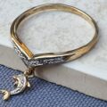 Wishbone Chevron Ring with Dolphin Charm in 9ct Gold.