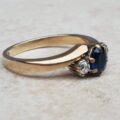 Sapphire and Diamond Trilogy Bypass Ring in 9ct Gold, a UK I 1/2 or a US 4 3/4.