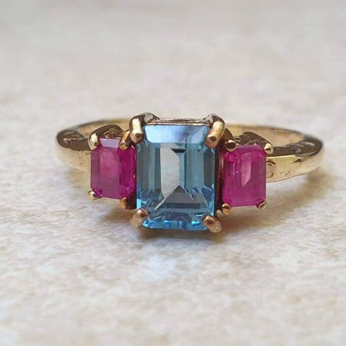 Topaz and Synthetic Ruby Trilogy Ring in 9ct Gold.