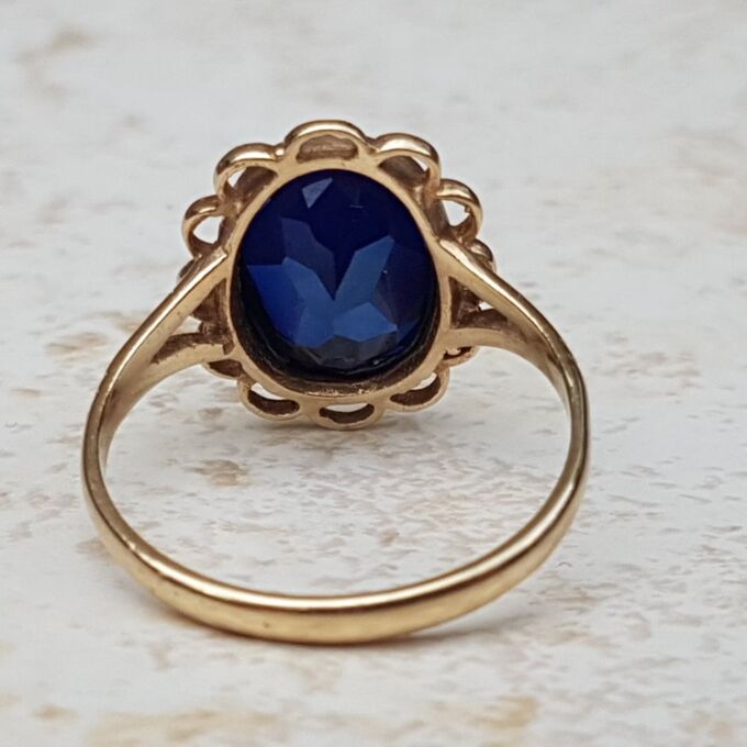 Synthetic Sapphire Solitaire Ring in 9ct Gold, a UK K or a US 5 3/4.