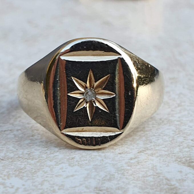 Heavy Oval Diamond Set Signet in 9ct Gold.