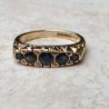 Blue Sapphire Five Stone Ring in 9ct Yellow Gold, a UK K 1/2 or a US 5 3/4.